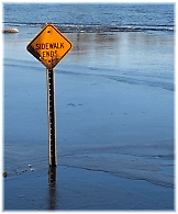 Flash flood, submerged sign